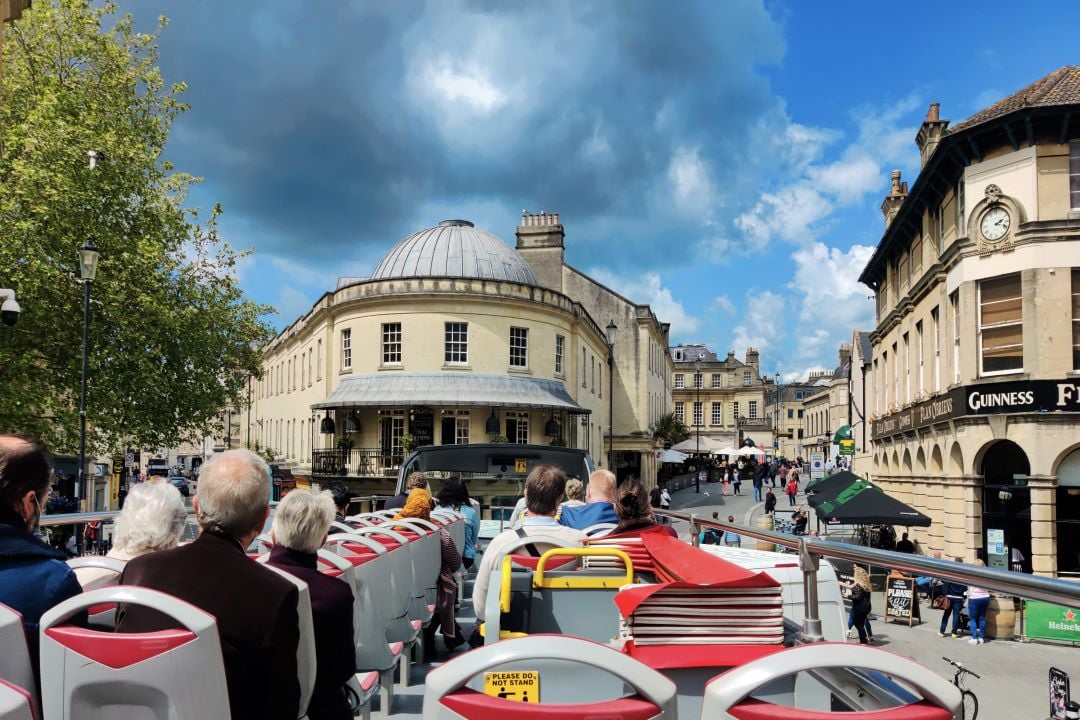 A photo from atop an open-top bus tour in Bath.