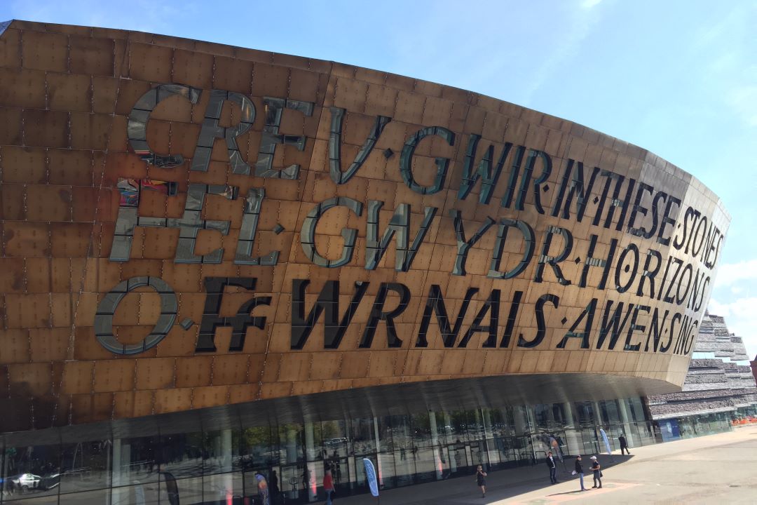 A photo of Cardiff's Millennium Center in the day time.