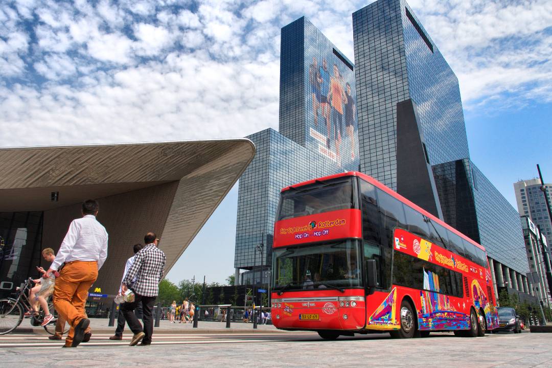 A Rotterdam bus tour passing by Delftse Poort.