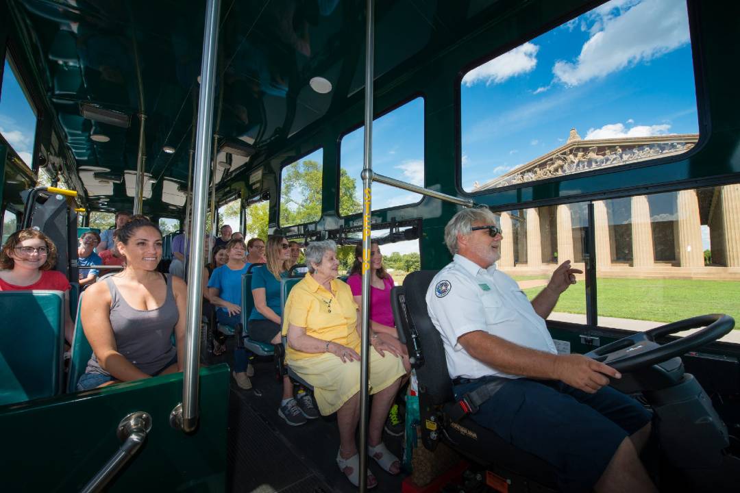 A photo of a group of people on a bus tour in Nashville.