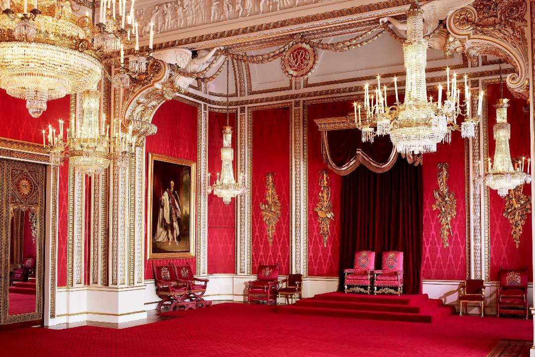 A photo of Buckingham Palace's throne room.