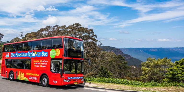 An Australian bus tour driving in Katoomba.