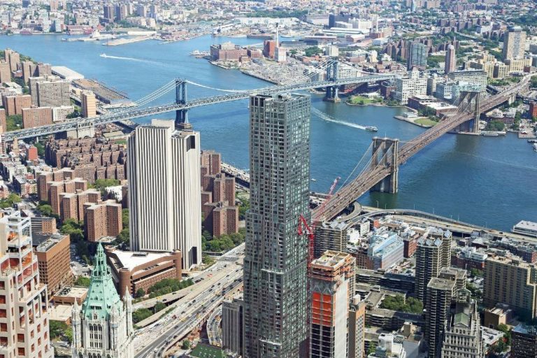 An aerial view of Brooklyn Bridge and the One World Observatory.