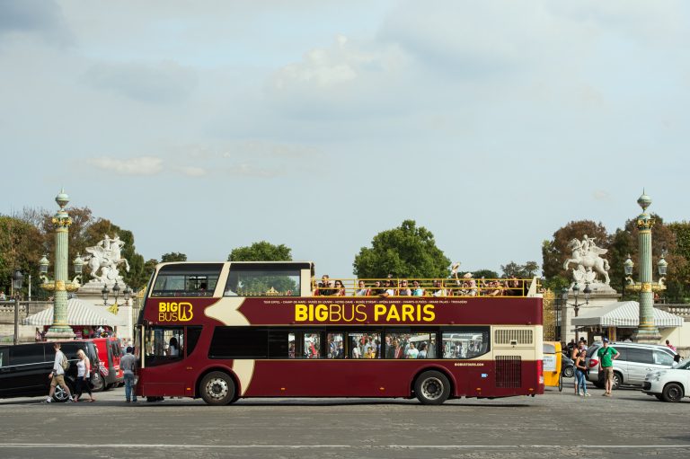 A photo of a Big Bus tour in Paris.
