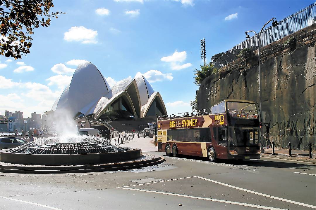 A bus tour near Sydney Opera house.