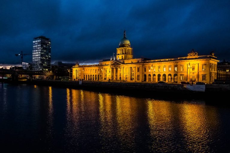 A photo of the Custom House at night.